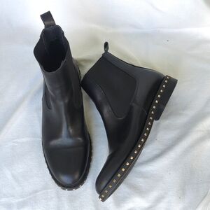 Stylish Black Ankle Boots with Gold Accents